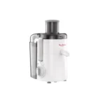 A compact white Moulinex juicer facing forward, featuring a transparent lid, a grey food pusher, a side-attached pulp container, and a rotary speed control dial on the front.