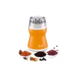 Orange Moulinex Coffee Grinder AR110027 surrounded by piles of coffee beans, red beans (maharagwe), spices (cinnamon), and ground powders, demonstrating its versatility for grinding various ingredients.